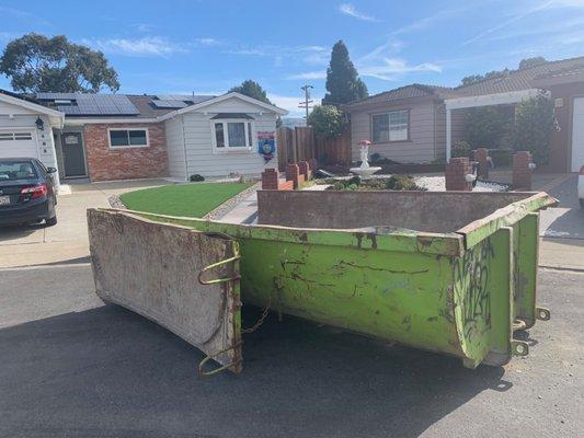 This is how they deliver the dumpster. My house is on the right hand side. They did that facing my neighbors.