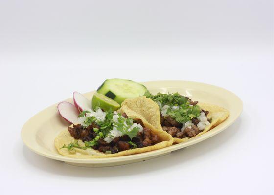 Taco al pastor y taco de asada