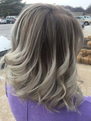 Smoke silver color with a shadow root.