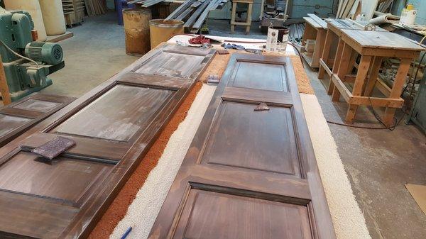 Panel doors being stained.