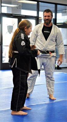 Coach Kevin instructing a student