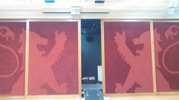 St Andrews in potomac stage doors custom made by hawkins floor with there school mascot