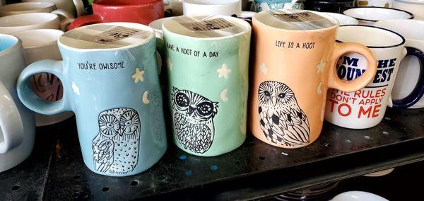 Cute trio of mugs! Blue: You're owlsome, Green: Have a hoot of a day, Orange: Life is a hoot.  Sold as a set. I think they're $7.00.