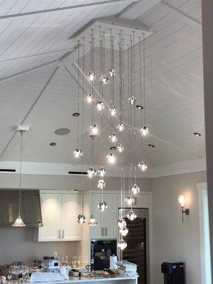 We install a chandelier lights, including t&g ceiling and all the kitchen cabinets.