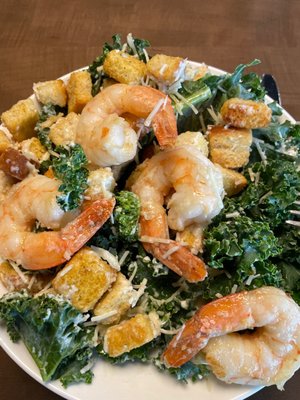 Order a kale salad including shrimp adding $10.  That provides exactly 4 pieces of shrimp, $2.5 per shrimp.