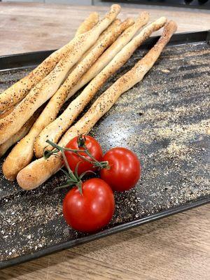 Freshly made breadstick for you to enjoy at home. Available for purchase on the website.