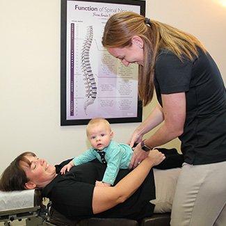 Dr. LaRocque adjusting pediatric patient