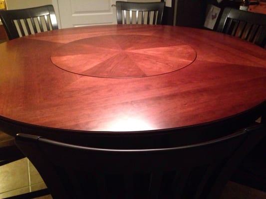 Unique kitchen table with lazy Susan built into center.