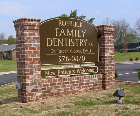 Roebuck Family Dentistry's new Monument Sign by the road