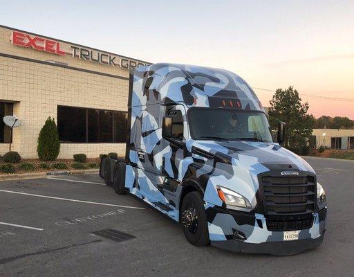 Freightliner Cascadia parked in front