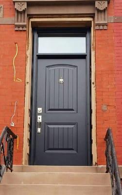 Steel door with transom, in Brooklyn, ny. Brownstone.