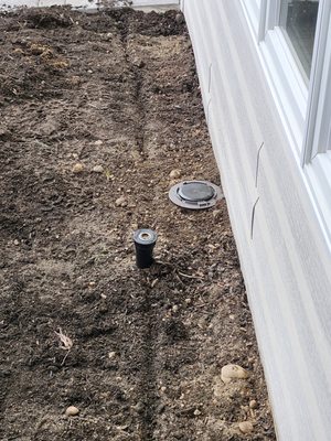 Installed termite stations and protected the sprinkler system by now breaking the line