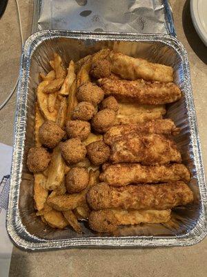 Fish, hush puppies and fries. Also came with separate containers of coleslaw and tarter sauce