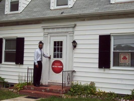 Agent at office door