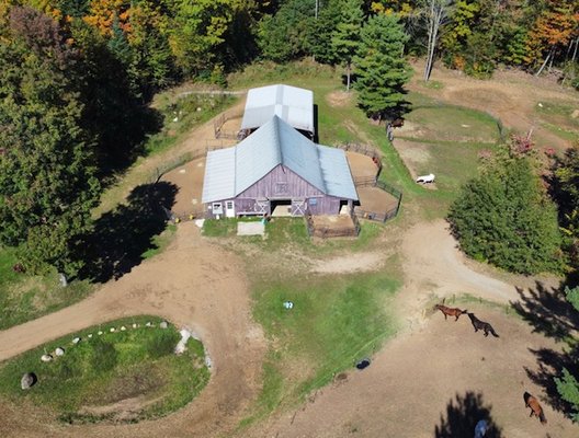 Premium full Board, covered riding arena, miles and miles of trails..