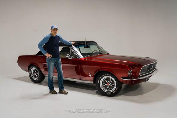 Happy customer taking delivery of his 1967 Mustang Convertible after restoration work was completed.