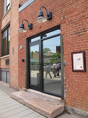 In 1875 this shed-roofed, brick building served as the forge
 shop of the Kidd Iron Works that straddled Brown's Race Track.