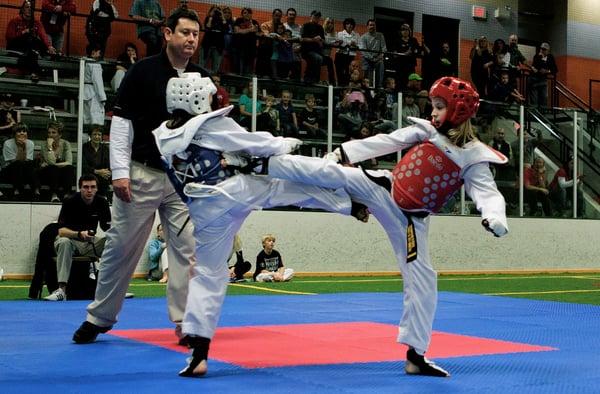 Competitve Team Member fighting at the 2012 Kansas State Championship. She went on to win Gold!