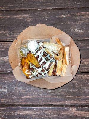 Chicharrones de Pollo Peruano with Yuca Fries and Platano Maduros.