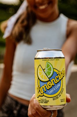 Limoncito is sunshine in a can. Made with real lemon, lime, local honey and cane sugar.