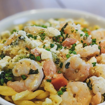 Shrimp Scampi with arugula, tomato and feta cheese