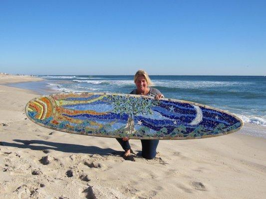 One of a kind handmade glass mosaic surfboard by owner and artist Mary Tantillo.