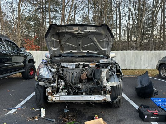 Accident repair on 2004 Honda CRV (bumper headlight radiator condenser alternator and ac compressor