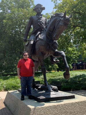 Brother next to statue of General "Mad" Anthony Wayne