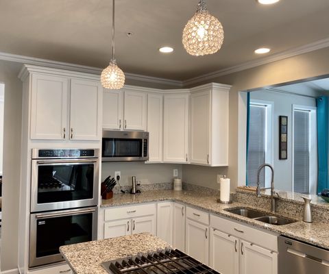 The crown molding over cabinets.