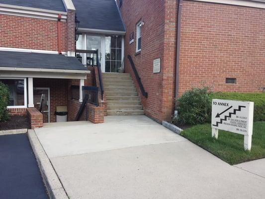 Picture of the back door, rear of building. That's the stairwell to get in.