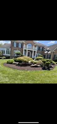 Landscaping fresh mulch, weeding, edge trimming