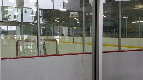 View of rink from inside lobby.  Its great that you can watch from the warmth of the lobby