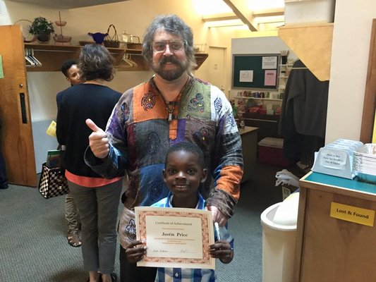 President Scott McGowan awards a certificate after an excellent performance today at our 4/30 2pm recital.