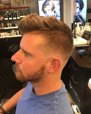 Modern classic fade and barbering by Aveda Men, a premier barbershop in downtown St. Petersburg, FL.