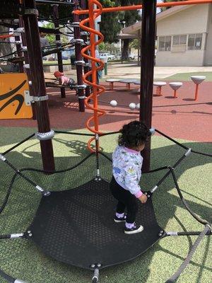 Rope web under a slide