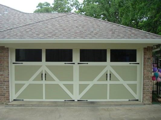 Get a beautiful carriage house door on your house today!