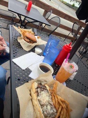 Pulled pork, barbecue sandwich, and French dip the locks and the tutti-frutti drink