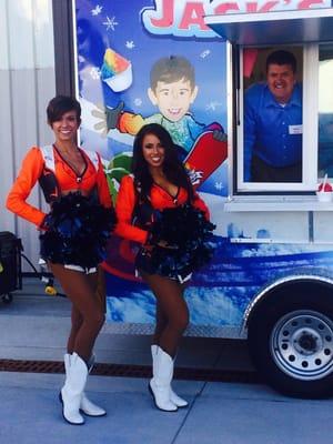 Bronco cheerleaders stopped by at the Saddle Up! Foundation Suitcase Party at Centennial Airport.