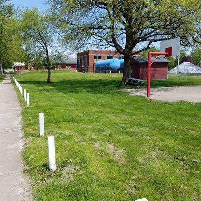 lawn area and parallel parking on the street