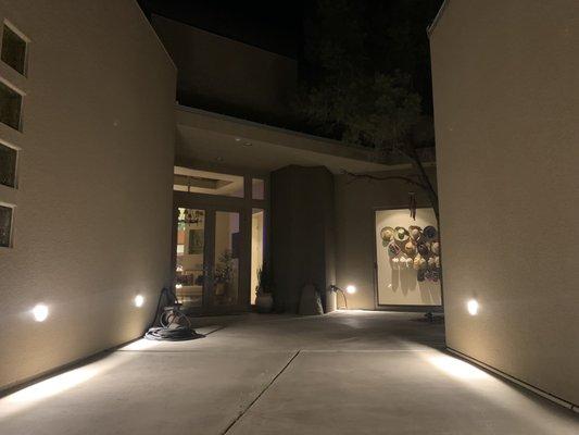 Exterior wall mounted pathway lighting.