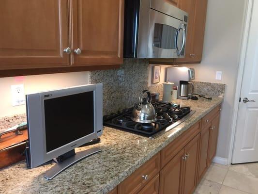 LED under cabinet lights help our client's visibility around the kitchen.