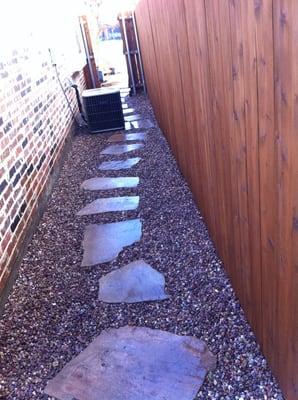 Flagstone walkway where grass would not grow because it did not get any sun and was just mud.