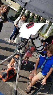 Solar telescope, sun looks bright neon red ;)