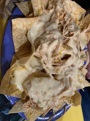 Shredded Chicken Nachos with lukewarm "cheese"