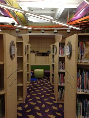 View of hand puppet stage. The perfect place for kids to play while mom gets kid books.