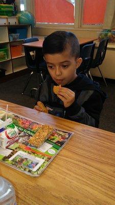 My son enjoying his free breakfast