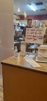 Employee working without a mask l, preparing the food, bagging it. I saw him touch his nose, mouth and then touching the soda bottle.