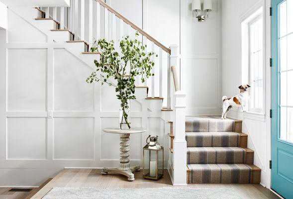 Elegant stairwell with a beach vibe