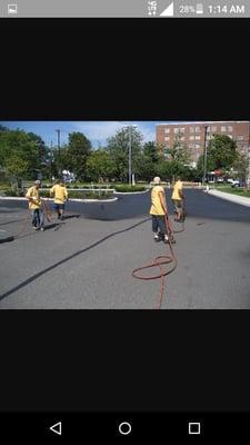 Sealcoating a parking lot