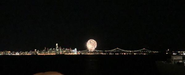 On the flight deck, watching the fireworks from San Francisco, across the Bay